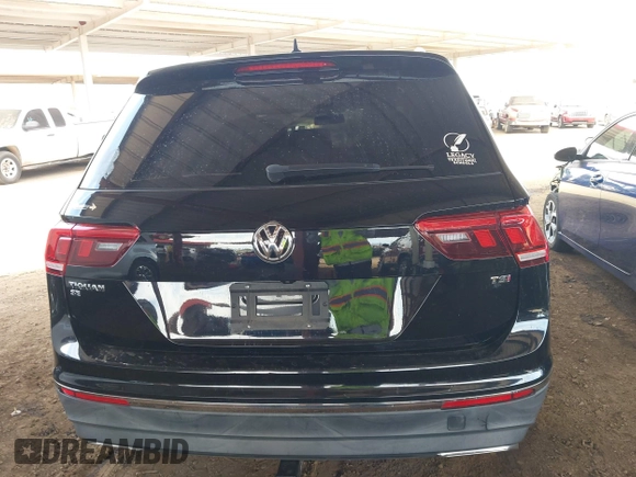 2018 Volkswagen Tiguan SEL z VIN 3VV3B7AX1JM036551, wystawiony jako IAAI lot #42170151 z przebiegiem 97 506 mil mil oraz . Historia ofert i sprzedaży dostępna na DreamBid. Obrazek 16.