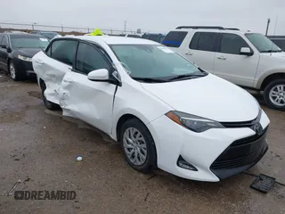 2018 Toyota Corolla L with VIN 5YFBURHEXJP748747, listed as a IAAI auction lot 41614144 with 119,797 mi miles and . Bid and sale history available at DreamBid. Image 1.