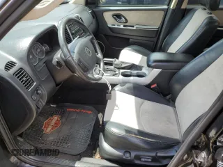 2005 Mercury Mariner Luxury z VIN 4M2CU57185DJ16120, wystawiony jako Copart lot #61803024 z przebiegiem 176 498 mil mil oraz Szkody całkowita. Historia ofert i sprzedaży dostępna na DreamBid. Obrazek 7.