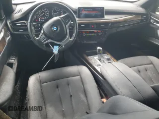2017 BMW X5 xDrive35i z VIN 5UXKR0C50H0U53714, wystawiony jako Copart lot #57899365 z przebiegiem 124 846 mil mil oraz Szkoda całkowita • Salvage title. Historia ofert i sprzedaży dostępna na DreamBid. Obrazek 8.