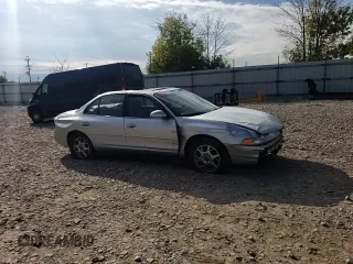 2000 Oldsmobile Intrigue GLS z VIN 1G3WX52H0YF233648, wystawiony jako Copart lot #72619824 z przebiegiem Nie podano mil oraz Nie do naprawy. Historia ofert i sprzedaży dostępna na DreamBid. Obrazek 10.