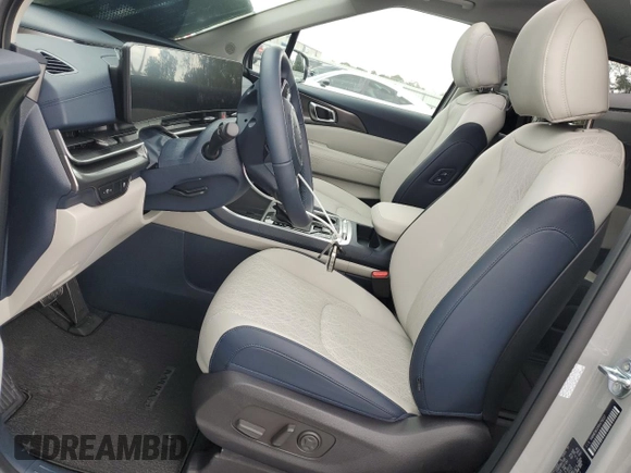 2025 Kia Carnival SX Prestige with VIN KNDNE5K33S6479557, listed as a Copart auction lot 79474994 with 327 mi miles and Salvage Title. Bid and sale history available at DreamBid. Image 7.