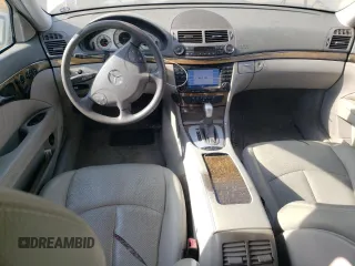 2005 Mercedes-Benz E 5.0L with VIN WDBUF70J75A693702, listed as a Copart auction lot 63497604 with 122,410 mi miles and Clean Title. Bid and sale history available at carsss.com. Image 8.