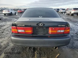 1997 Lexus ES 300 Luxury Sport Sdn with VIN JT8BF22G5V0057703, listed as a Copart auction lot 84712734 with 160,575 mi miles and Salvage Title. Bid and sale history available at carsss.com. Image 6.