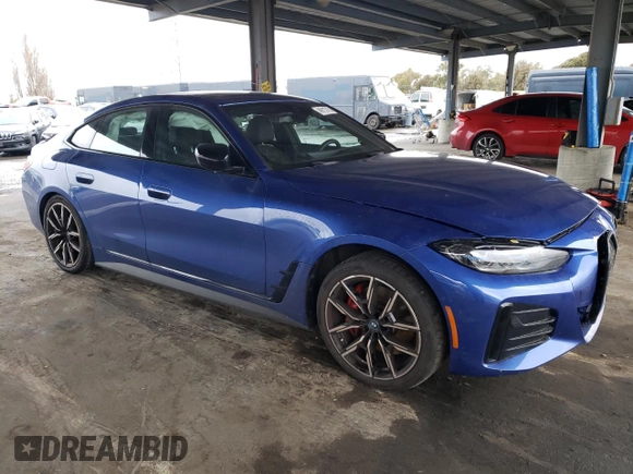 2023 BMW i4 eDrive40 with VIN WBY73AW07PFR45505, listed as a Copart auction lot 49113715 with 12,876 mi miles and Salvage Title. Bid and sale history available at carsss.com. Image 4.