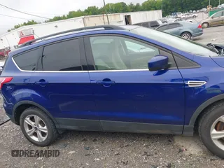 2016 Ford Escape SE z VIN 1FMCU9GX9GUB75094, wystawiony jako IAAI lot #42331270 z przebiegiem 162 288 mil mil oraz . Historia ofert i sprzedaży dostępna na DreamBid. Obrazek 13.