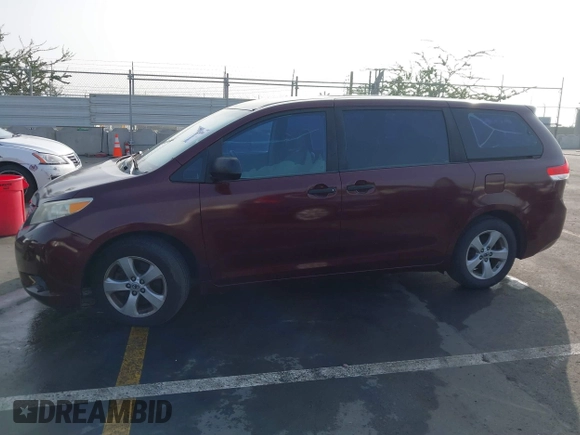 2011 Toyota Sienna with VIN 5TDZK3DCXBS157316, listed as a IAAI auction lot 41240896 with 117,437 mi miles. Bid and sale history available at carsss.com. Image 14.