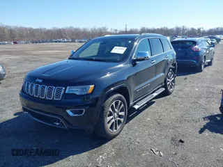 2018 Jeep Grand Cherokee High Altitude with VIN 1C4RJFCT6JC102660, listed as a IAAI auction lot 41752965 with 119,841 mi miles. Bid and sale history available at carsss.com. Image 17.
