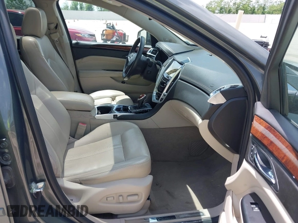 2013 Cadillac SRX Luxury Collection z VIN 3GYFNCE39DS542125, wystawiony jako IAAI lot #42067672 z przebiegiem 158 013 mil mil oraz . Historia ofert i sprzedaży dostępna na DreamBid. Obrazek 5.