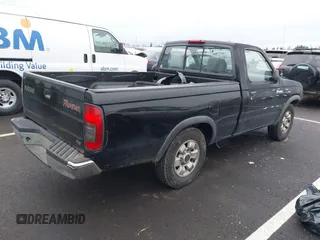 2000 Nissan Frontier XE with VIN 1N6DD21S5YC399416, listed as a IAAI auction lot 41573002 with 158,198 mi miles and . Bid and sale history available at DreamBid. Image 4.