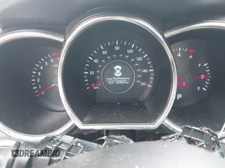 2014 Kia Optima LX with VIN 5XXGM4A70EG260667, listed as a IAAI auction lot 42531882 with 147,829 mi miles and . Bid and sale history available at DreamBid. Image 7.