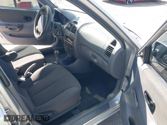 2002 Hyundai Accent GL with VIN KMHCG45C82U268756, listed as a IAAI auction lot 41569829 with 89,752 mi miles. Bid and sale history available at carsss.com. Image 5.