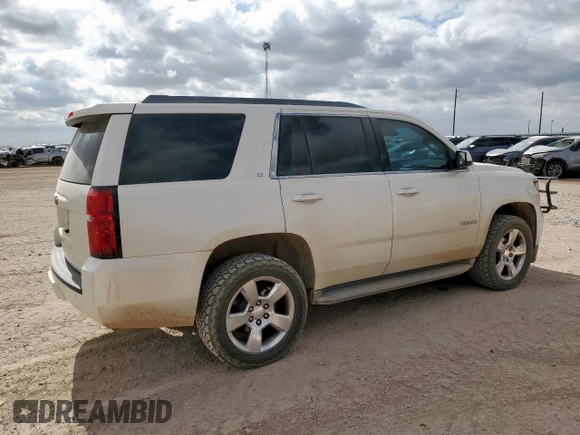 2015 Chevrolet Tahoe LT с VIN 1GNSCBKC6FR107228, выставлен на аукционе Copart как лот 61493715 с пробегом 184 151 миль миль и Чистый • Clean title. История ставок и продаж доступна на DreamBid. Изображение 3.