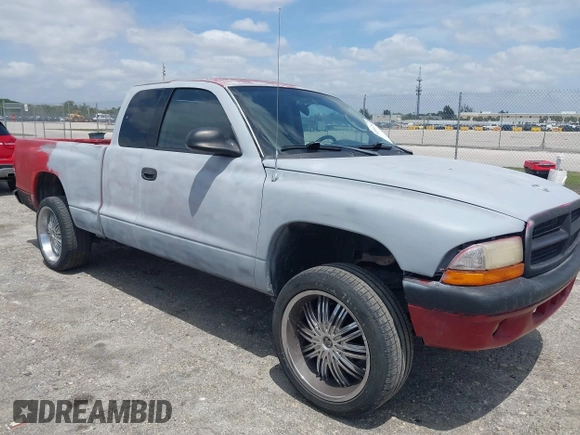 2002 Dodge Dakota Sport with VIN 1B7GL32X82S632091, listed as a IAAI auction lot 42091290 with 206,721 mi miles and . Bid and sale history available at carsss.com. Image 1.
