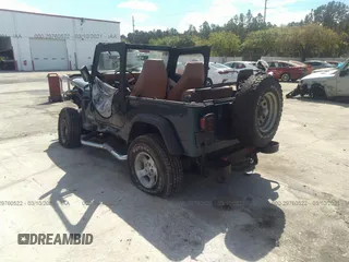 1995 Jeep Wrangler S with VIN 1J4FY19P4SP207049, listed as a IAAI auction lot 41315322 with 12,454 mi miles. Bid and sale history available at carsss.com. Image 3.