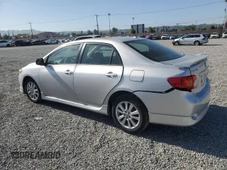2010 Toyota Corolla z VIN 1NXBU4EE2AZ380585, wystawiony jako Copart lot #57024125 z przebiegiem 175 334 mil mil oraz Szkoda całkowita • Salvage title. Historia ofert i sprzedaży dostępna na DreamBid. Obrazek 2.