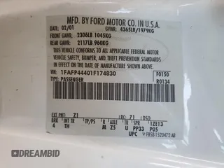 2001 Ford Mustang Deluxe z VIN 1FAFP44401F174830, wystawiony jako Copart lot #59810595 z przebiegiem Nie podano mil oraz Szkoda całkowita • Salvage title. Historia ofert i sprzedaży dostępna na DreamBid. Obrazek 12.