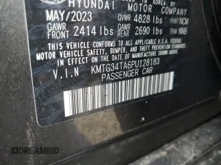 2023 Genesis G70 2.0T with VIN KMTG34TA6PU128183, listed as a Copart auction lot 39857364 with Not Provided miles and Salvage Title. Bid and sale history available at DreamBid. Image 12.
