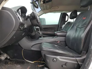 2013 Dodge Durango R/T with VIN 1C4SDHCT0DC648668, listed as a Copart auction lot 83211194 with 149,649 mi miles and Salvage title. Bid and sale history available at DreamBid. Image 7.