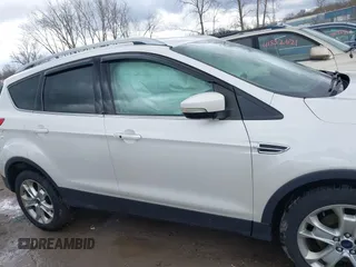 2016 Ford Escape Titanium with VIN 1FMCU9JX9GUA62674, listed as a IAAI auction lot 41838996 with 135,105 mi miles. Bid and sale history available at carsss.com. Image 14.