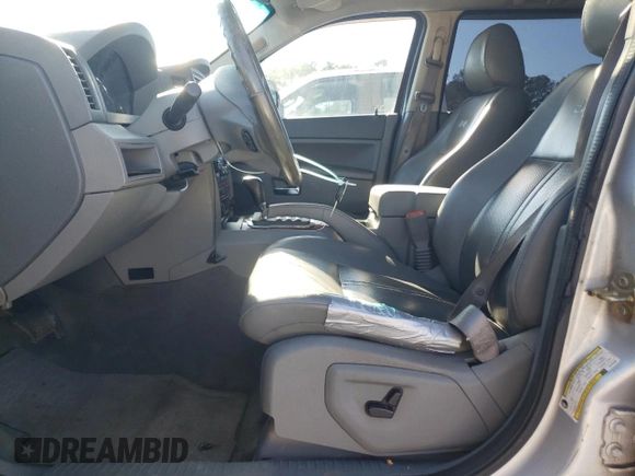 2006 Jeep Grand Cherokee Limited with VIN 1J8HS58N36C122006, listed as a Copart auction lot 87159044 with 225,987 mi miles and Salvage title. Bid and sale history available at DreamBid. Image 7.