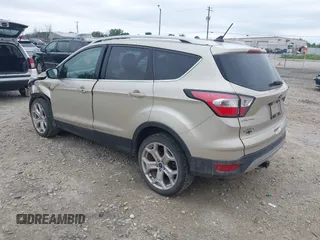 2018 Ford Escape Titanium with VIN 1FMCU9J94JUA44964, listed as a IAAI auction lot 42494471 with 100,955 mi miles and . Bid and sale history available at DreamBid. Image 3.