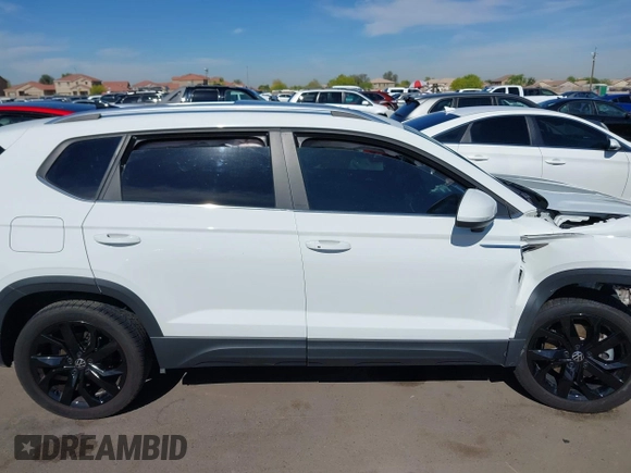 2022 Volkswagen Taos SE z VIN 3VVTX7B2XNM018298, wystawiony jako IAAI lot #42066332 z przebiegiem 36 025 mil mil oraz . Historia ofert i sprzedaży dostępna na DreamBid. Obrazek 14.