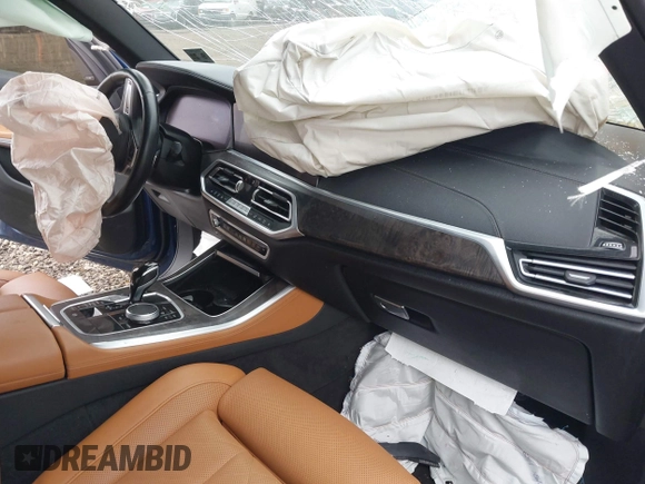 2023 BMW X5 xDrive40i z VIN 5UXCR6C08P9N95511, wystawiony jako IAAI lot #41901359 z przebiegiem 55 662 mil mil oraz . Historia ofert i sprzedaży dostępna na DreamBid. Obrazek 5.