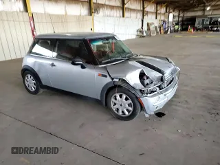 2004 MINI Hardtop with VIN WMWRC33404TJ58046, listed as a Copart auction lot 46358625 with 140,934 mi miles and Salvage Title. Bid and sale history available at DreamBid. Image 11.