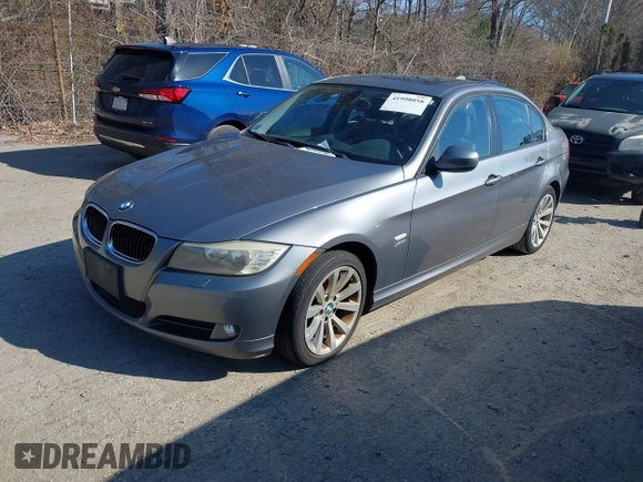 2011 BMW 3 Series 328i xDrive with VIN WBAPK7C57BA819476, listed as a IAAI auction lot 41998058 with 150,412 mi miles. Bid and sale history available at carsss.com. Image 2.