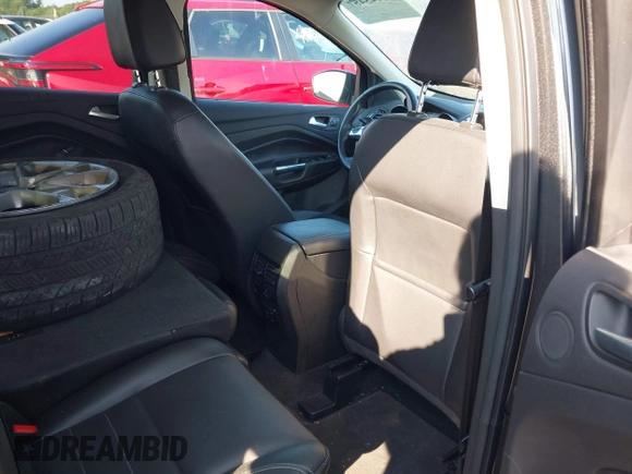 2016 Ford Escape Titanium with VIN 1FMCU9J99GUB27573, listed as a IAAI auction lot 42445457 with 156,784 mi miles and . Bid and sale history available at DreamBid. Image 8.