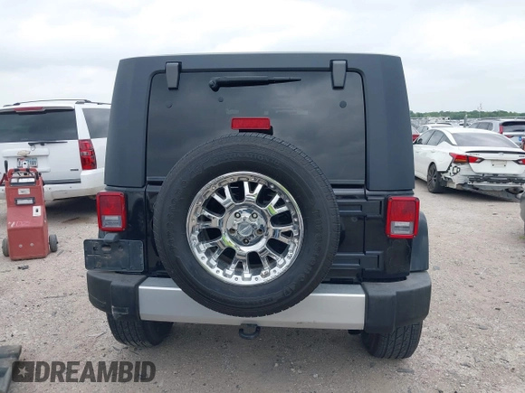 2008 Jeep Wrangler Unlimited Sahara с VIN 1J4GA59188L624010, выставлен на аукционе IAAI как лот 42115574 с пробегом 105 800 миль миль и . История ставок и продаж доступна на DreamBid. Изображение 16.