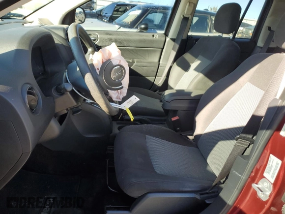 2016 Jeep Compass Sport with VIN 1C4NJDBB0GD713069, listed as a Copart auction lot 80003774 with 92,872 mi miles and Salvage title. Bid and sale history available at DreamBid. Image 7.