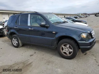 2001 Mercedes-Benz M-Class with VIN 4JGAB54E61A276417, listed as a Copart auction lot 82878094 with 205,577 mi miles and Salvage Title. Bid and sale history available at carsss.com. Image 4.
