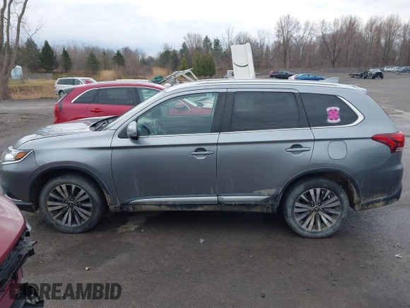 2020 Mitsubishi Outlander ES z VIN JA4AZ3A34LZ021352, wystawiony jako IAAI lot #41853465 z przebiegiem 92 412 mil mil oraz . Historia ofert i sprzedaży dostępna na DreamBid. Obrazek 14.