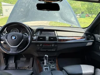 2013 BMW X5 xDrive35i z VIN 5UXZV4C53D0B00978, wystawiony jako Copart lot #56523455 z przebiegiem 170 241 mil mil oraz Czysty tytuł • Clean title. Historia ofert i sprzedaży dostępna na DreamBid. Obrazek 9.