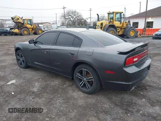 2014 Dodge Charger SXT with VIN 2C3CDXJG6EH372066, listed as a IAAI auction lot 41975705 with 112,672 mi miles. Bid and sale history available at carsss.com. Image 3.
