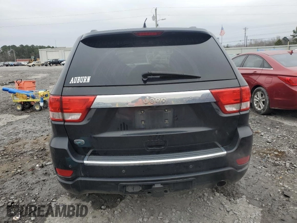 2013 Jeep Grand Cherokee Overland with VIN 1C4RJECG1DC546398, listed as a Copart auction lot 45834595 with 214,975 mi miles and Salvage Title. Bid and sale history available at carsss.com. Image 6.
