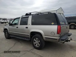 1998 GMC Suburban with VIN 3GKFK16R1WG510835, listed as a Copart auction lot 84566304 with 235,049 mi miles and Salvage Title. Bid and sale history available at carsss.com. Image 2.