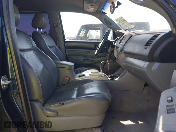 2008 Toyota Tacoma PreRunner with VIN 3TMJU62N78M062878, listed as a IAAI auction lot 41781780 with 247,276 mi miles. Bid and sale history available at carsss.com. Image 5.