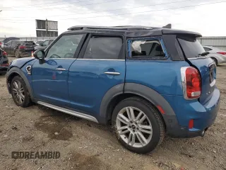 2018 MINI Countryman Cooper S with VIN WMZYT3C39J3E93309, listed as a Copart auction lot 60558285 with 50,907 mi miles and Salvage title. Bid and sale history available at DreamBid. Image 2.