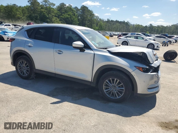 2020 Mazda CX-5 Touring z VIN JM3KFBCM2L1824072, wystawiony jako Copart lot #54825295 z przebiegiem 99 420 mil mil oraz Szkoda całkowita • Salvage title. Historia ofert i sprzedaży dostępna na DreamBid. Obrazek 4.