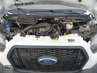 2023 Ford Transit Cargo with VIN 1FTBR2X8XPKB02099, listed as a IAAI auction lot 41576034 with 52,070 mi miles and . Bid and sale history available at DreamBid. Image 10.