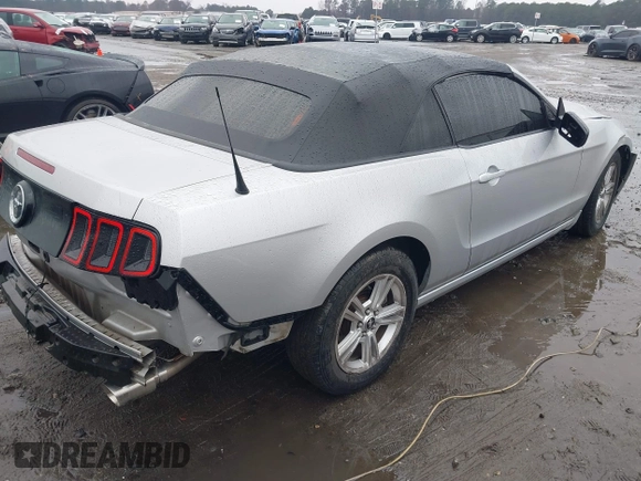 2013 Ford Mustang V6 with VIN 1ZVBP8EM4D5217006, listed as a IAAI auction lot 41560921 with 95,877 mi miles and . Bid and sale history available at DreamBid. Image 4.