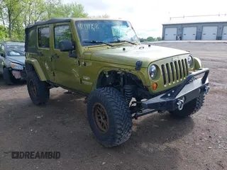 2008 Jeep Wrangler Unlimited Sahara with VIN 1J4GA59148L545255, listed as a IAAI auction lot 42177758 with 155,953 mi miles and . Bid and sale history available at DreamBid. Image 1.