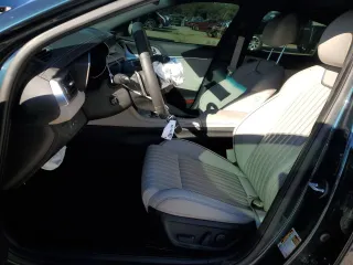 2023 Genesis G70 2.0T with VIN KMTG34TA5PU129955, listed as a Copart auction lot 82980774 with 12,625 mi miles and Salvage Title. Bid and sale history available at DreamBid. Image 7.