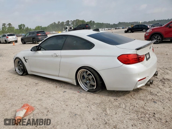 2015 BMW M4 with VIN WBS3R9C5XFK332533, listed as a Copart auction lot 57030615 with 97,739 mi miles and Salvage title. Bid and sale history available at DreamBid. Image 2.
