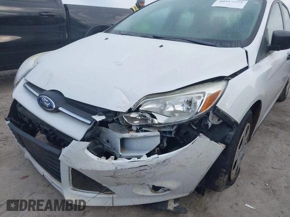 2013 Ford Focus S with VIN 1FADP3E20DL332636, listed as a IAAI auction lot 40917274 with 112,956 mi miles. Bid and sale history available at carsss.com. Image 6.