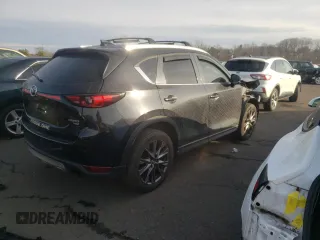 2021 Mazda CX-5 Signature with VIN JM3KFBEY2M0345187, listed as a Copart auction lot 82786984 with 98,014 mi miles and Salvage Title. Bid and sale history available at carsss.com. Image 3.