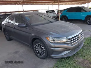 2021 Volkswagen Jetta S z VIN 3VWC57BU0MM028310, wystawiony jako IAAI lot #41938979 z przebiegiem 61 056 mil mil oraz . Historia ofert i sprzedaży dostępna na DreamBid. Obrazek 1.